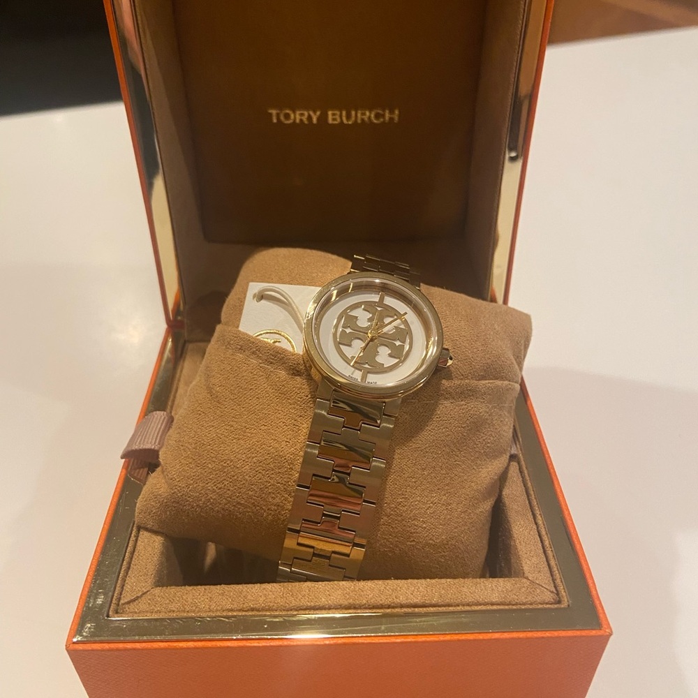Tory Burch Reva Gold Tone Stainless Steel Ladies Watch with Ivory Dial